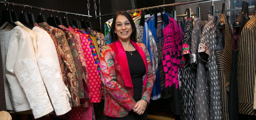 Lopa Patel is wearing a House of Gharats peacock silk Benarasi Brocade jacket with velvet lapel. Image by Count Creation taken at the Taj Khazana, London