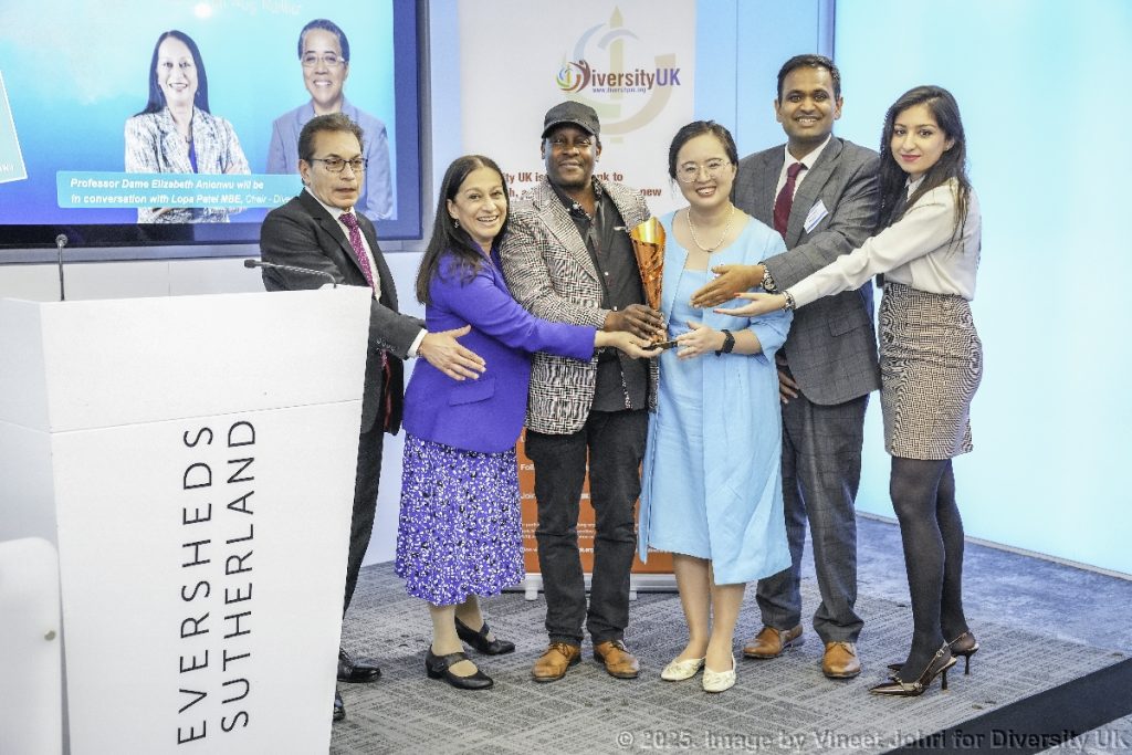 Trustees of Diversity UK present the beacon of the Paul Stephenson Lecture to Julz Davis of Curiosity UnLtd.