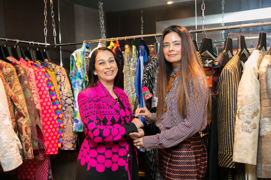 Lopa Patel and Neishaa Gharat - House of Gharats at The Taz Khazana London - Lopa is wearing a wool embroidered jacket inspired by Kutch - Image by Count Creation